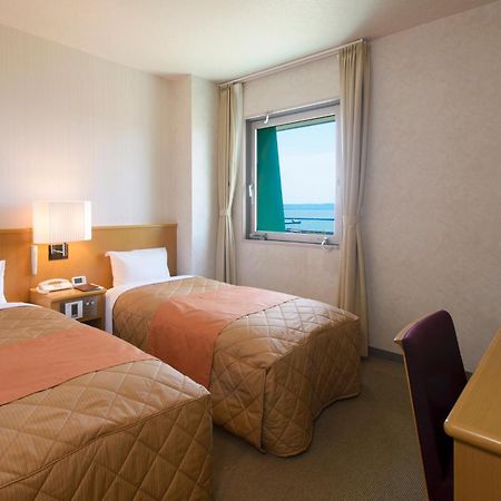 Hotel Folkloro Ominato Mutsu Habitación foto